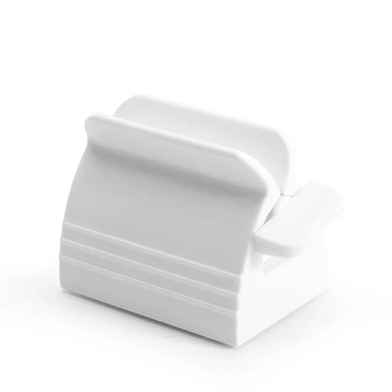 New Bathroom Accessories Toothpaste Squeezer Tooth Paste Dispenser Tube Squeezer Facial Cleanser Press Rolling Holder for Kids